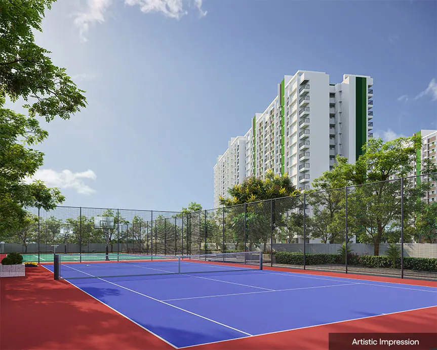 Tennis court next to the towers at Adarsh Parkland