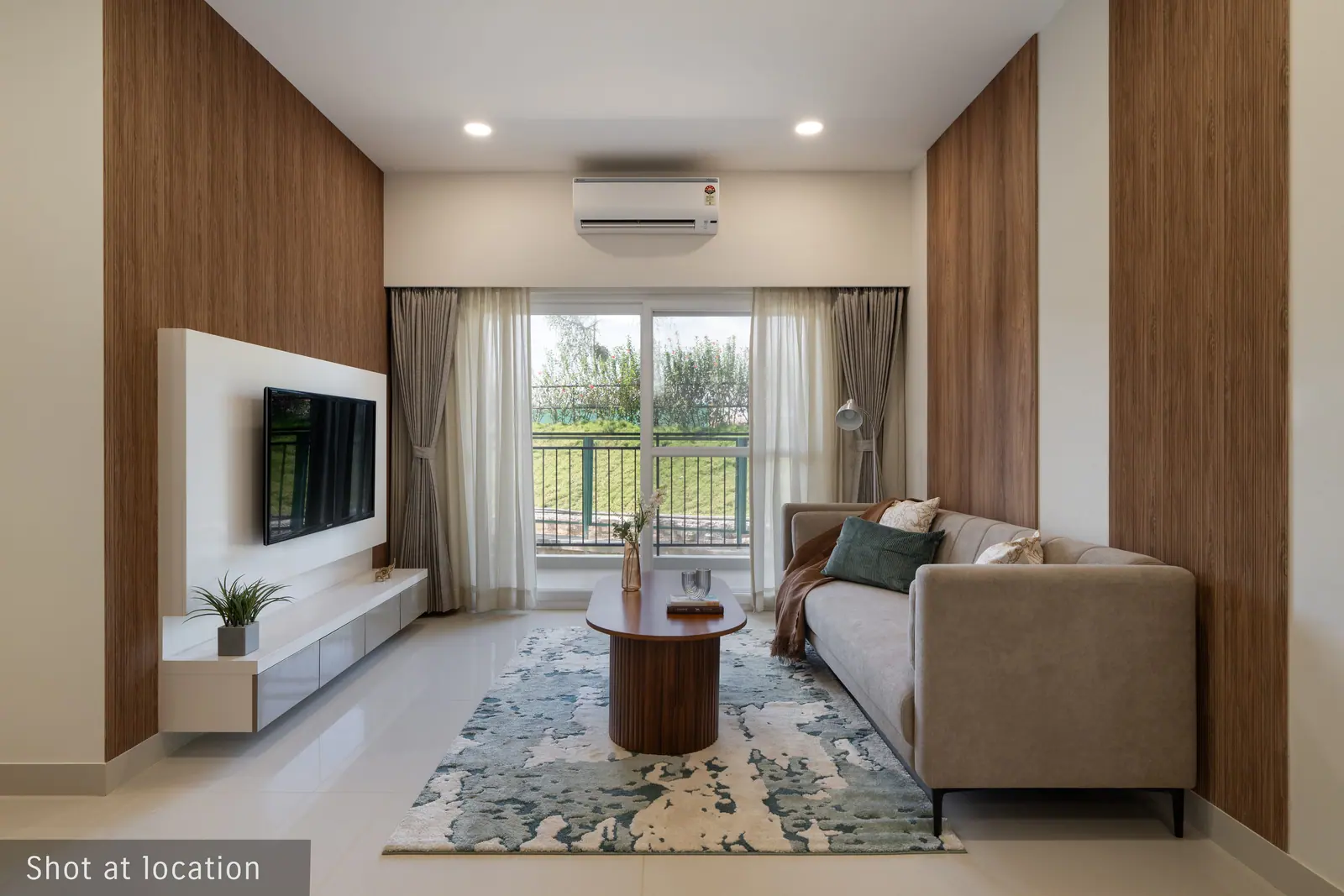 Living room shot at the Adarsh Tropica show flat