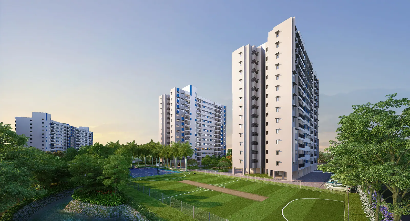 Central lawn between towers at Adarsh Tropica
