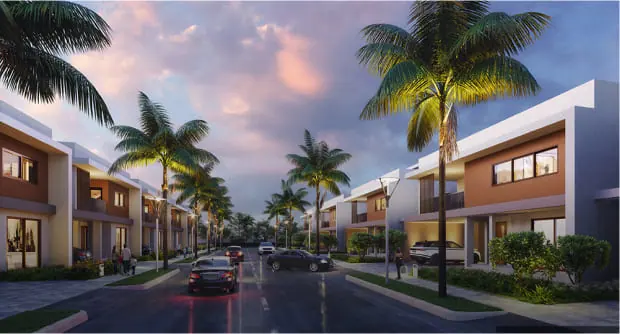 Palm-lined villa street at Adarsh Welkin Park
